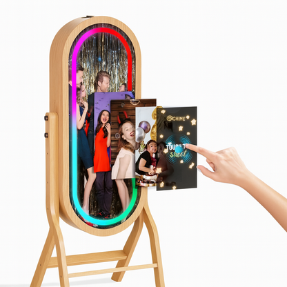 Interactive wooden photo booth display with touch input, front view on white background.